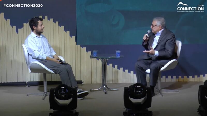O jornalista William Anthony e Márcio Coriolano, ex-presidente da Confederação Nacional das Seguradoras (CNseg) / Reprodução