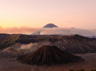 silhouette photo volcanoes during golden hour