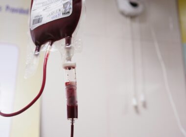 a blood test tube with a blood dropper attached to it