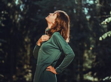 selective focus photo of woman looking up