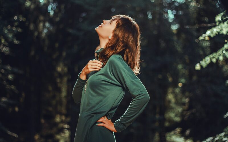 selective focus photo of woman looking up
