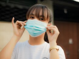 a woman wearing a face mask to protect herself from the sun
