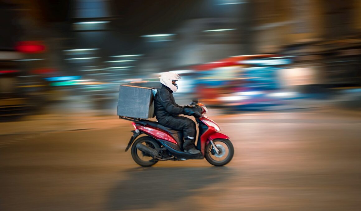 man riding motorcycle on road during daytime