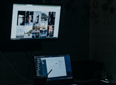 a laptop computer sitting on top of a desk