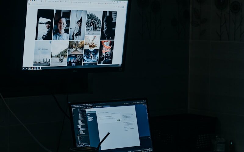 a laptop computer sitting on top of a desk
