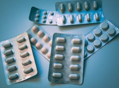 white and blue medication pill blister pack