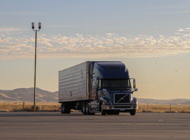 black truck on road during daytime