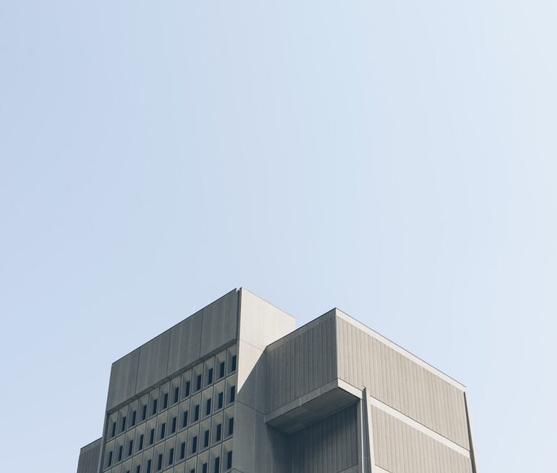 low angle photography of grey building
