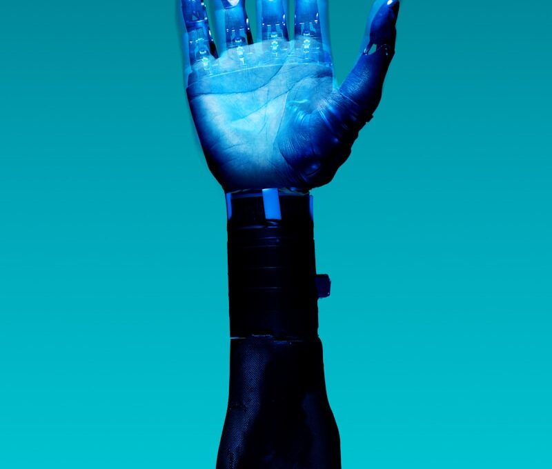 person holding blue light bulb