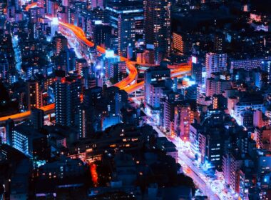 timelapse photography of vehicles and buildings