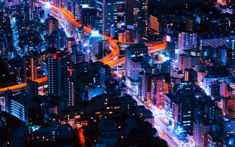 timelapse photography of vehicles and buildings