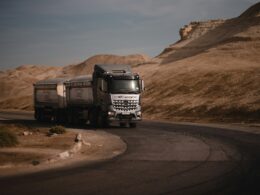 white and black truck on road during daytime