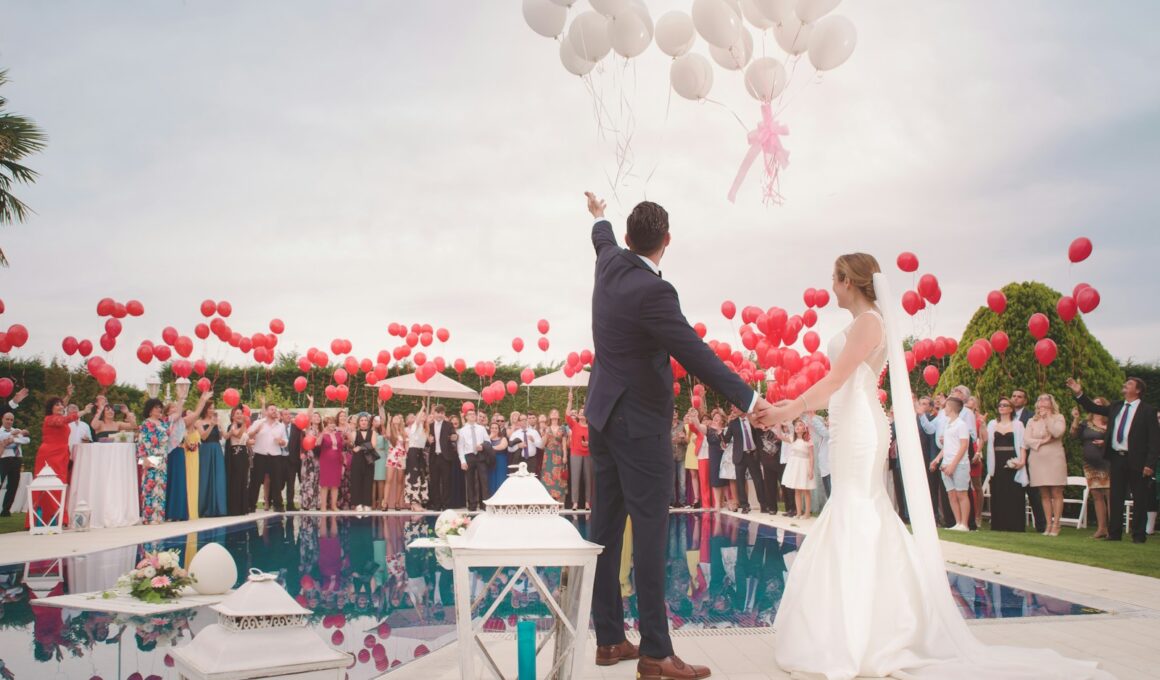 photo of a man and woman newly wedding holding a balloons