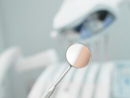 a close up of a toothbrush with a toothpaste on it