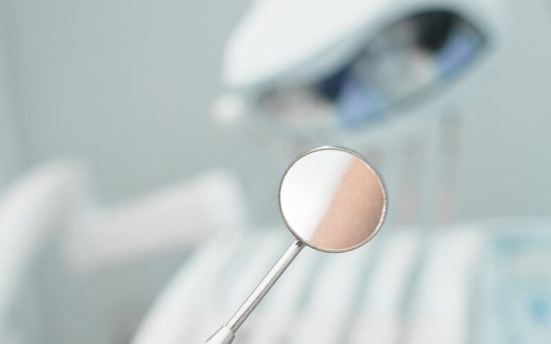 a close up of a toothbrush with a toothpaste on it