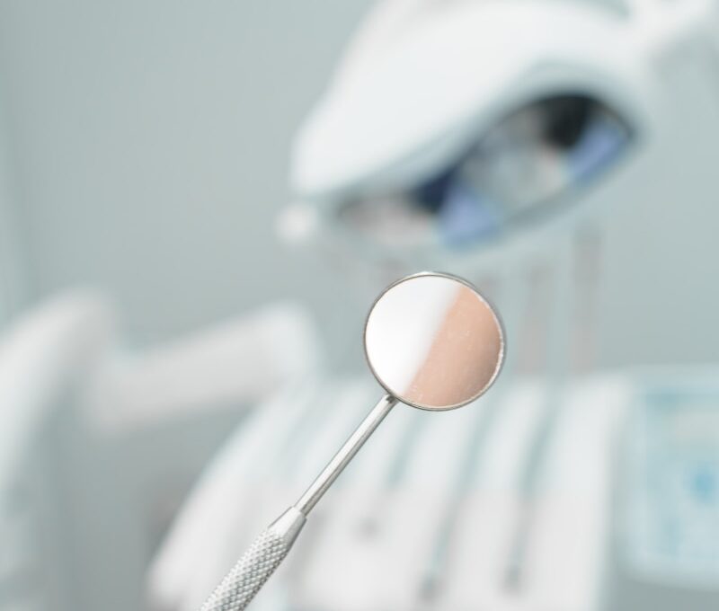 a close up of a toothbrush with a toothpaste on it
