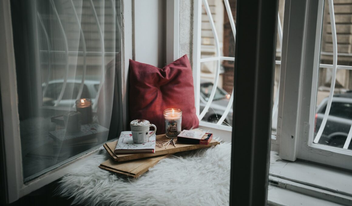 photo of gel candle on board beside pillow