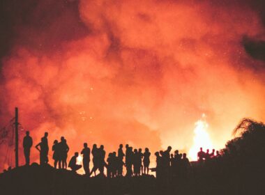 people near bonfire during night
