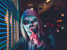 person standing near LED sign