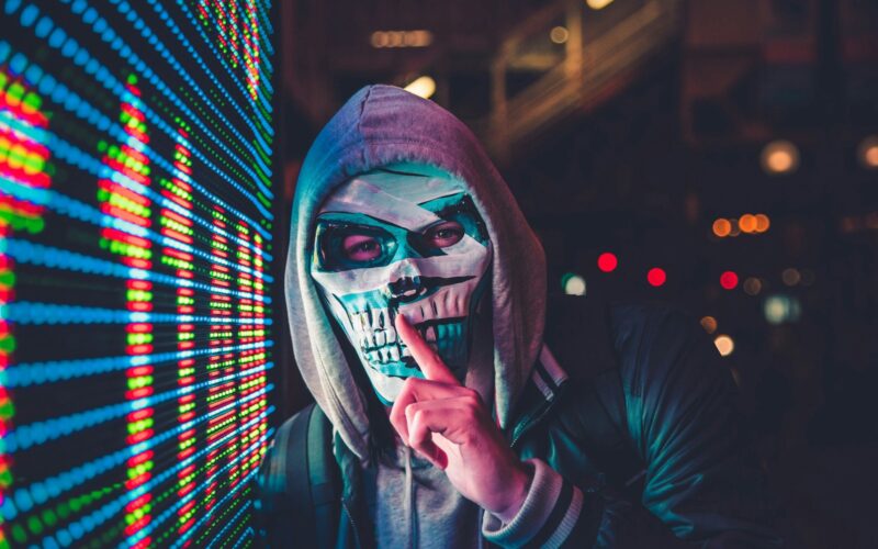 person standing near LED sign