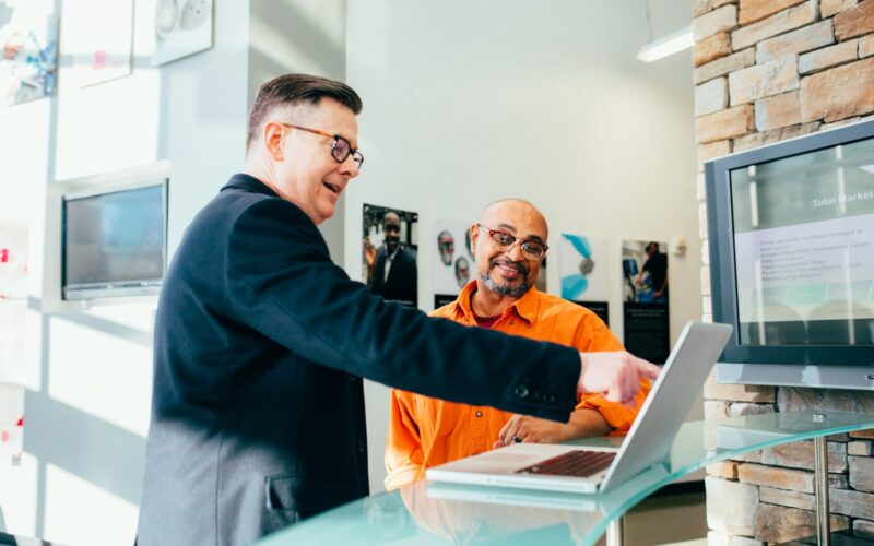 unknown person using laptop