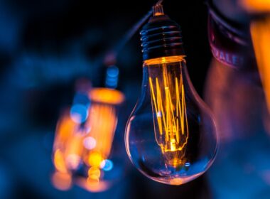 selective focus photography of clear light bulb
