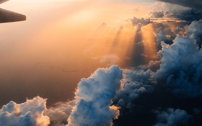 airplane on sky during golden hour
