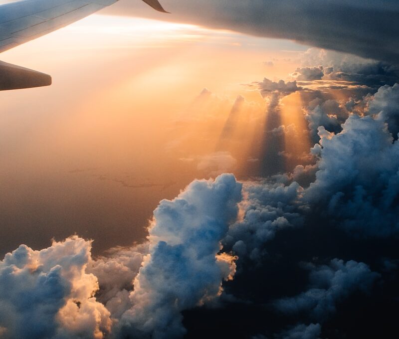 airplane on sky during golden hour