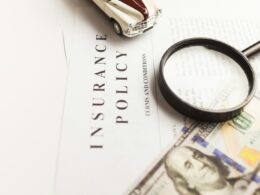 a magnifying glass sitting on top of a piece of paper