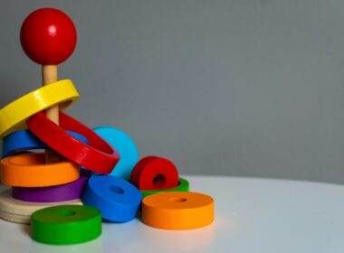 blue green yellow and red plastic toy