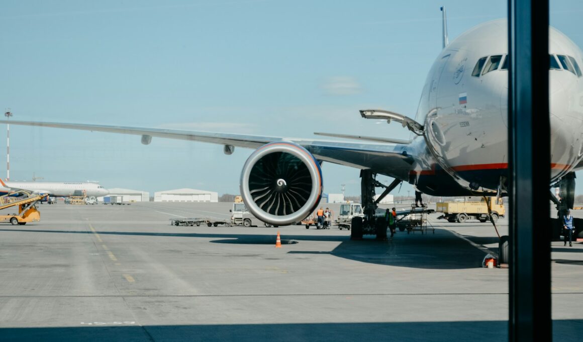 white airliner on runway