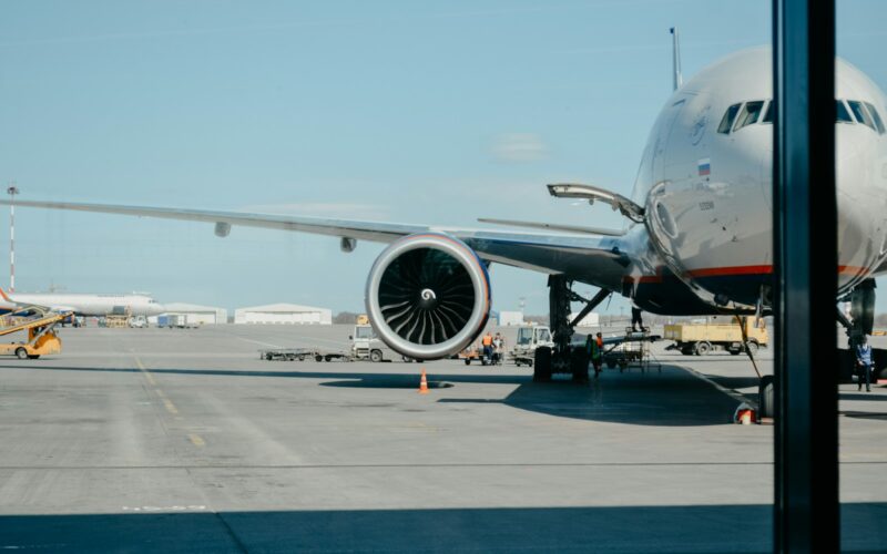 white airliner on runway