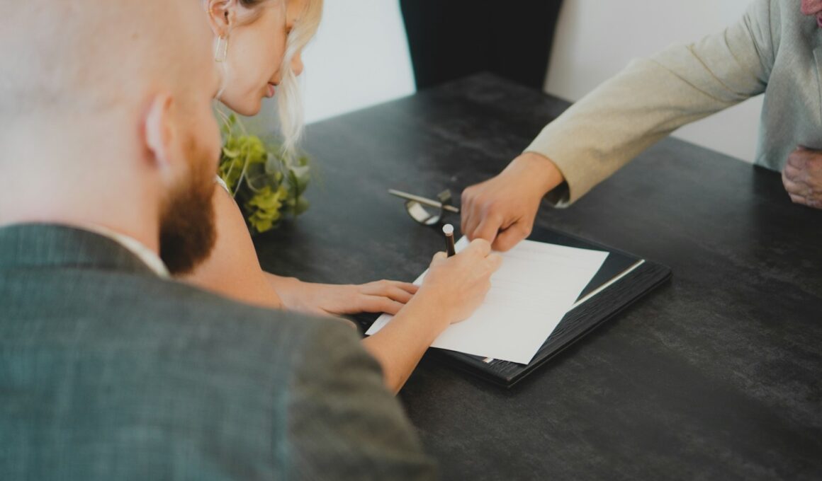 a woman showing a man something on a tablet
