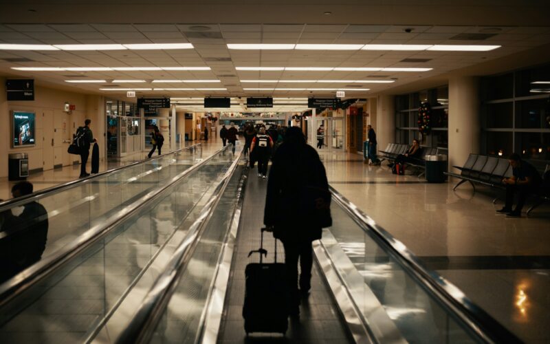 walking man holding luggage