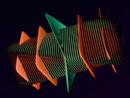 A group of orange and green objects against a black background