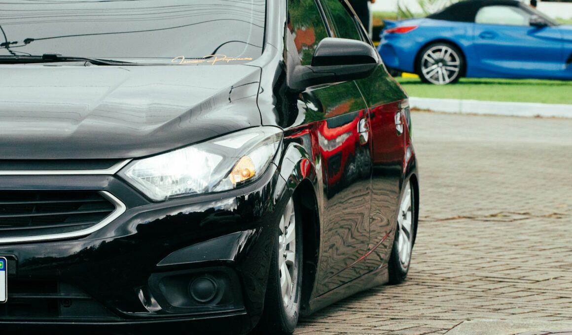 A black car parked on the side of the road