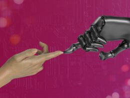 two hands touching each other in front of a pink background