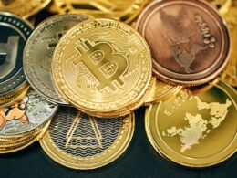 a pile of gold and silver bitcoins