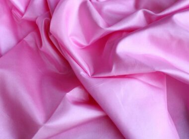 pink textile in close up photography