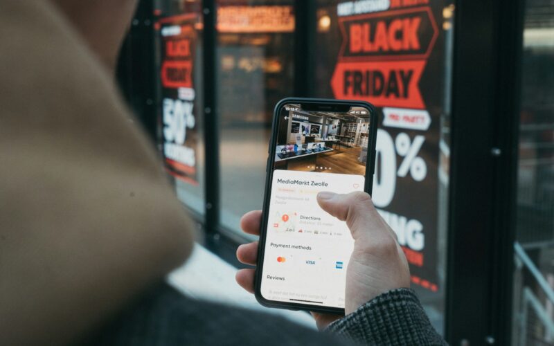 person holding black samsung android smartphone