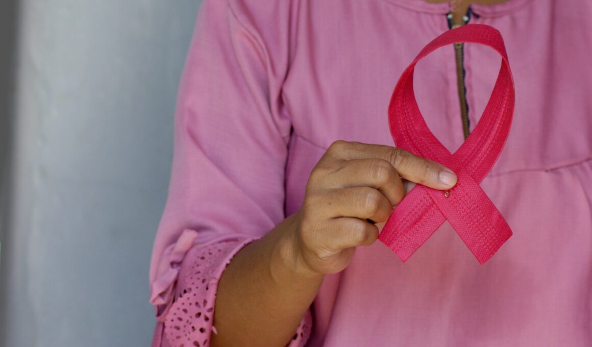 woman in pink and white polka dot shirt