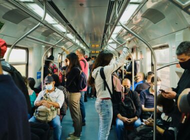 people in train during daytime