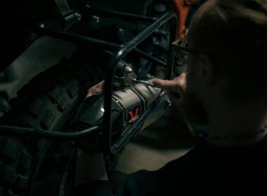 a man is working on a motorcycle engine