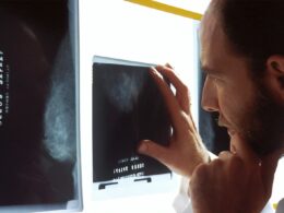 person holding black tablet computer