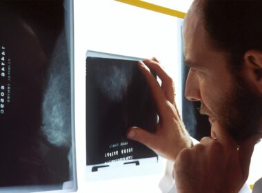 person holding black tablet computer