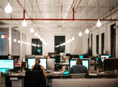 people sitting on chair in front of computer