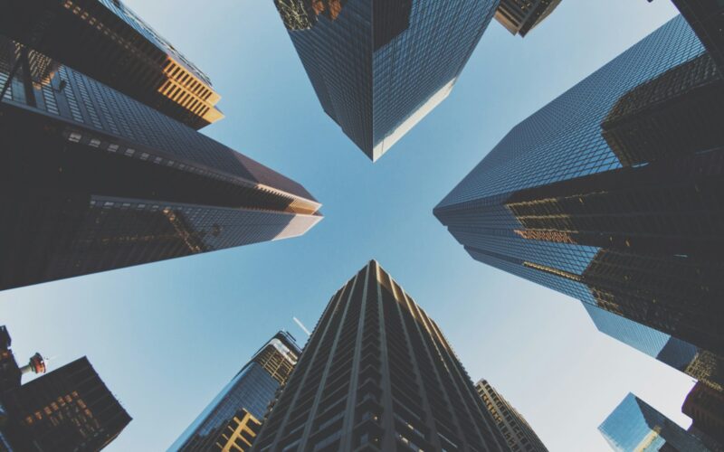 blue and black city buildings photography