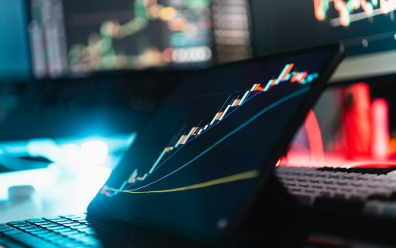 A laptop computer sitting on top of a desk